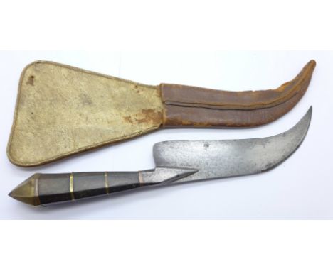 A Chilean Corvo knife with leather scabbard, scabbard a/f 