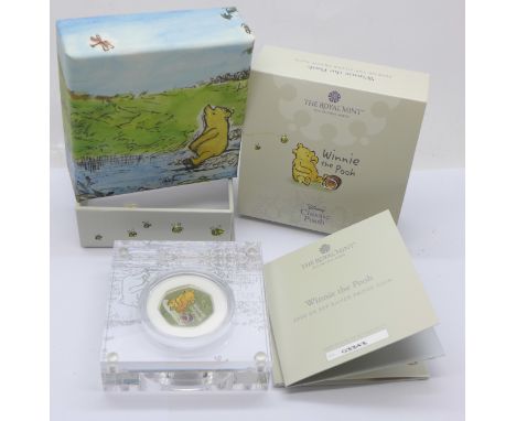 Coins;-2020 Disney Classic Winnie the Pooh UK 50p silver proof coin, appearing for the first time on coins, struck by The Roy