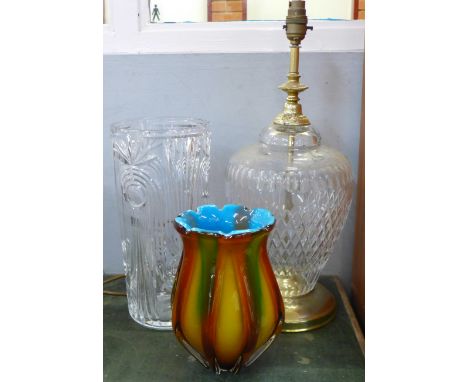 A glass table lamp base and two glass vases, a/f 