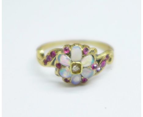 A Victorian yellow metal, diamond, opal and ruby cluster ring, 1.6g, L, (tests as high carat gold)