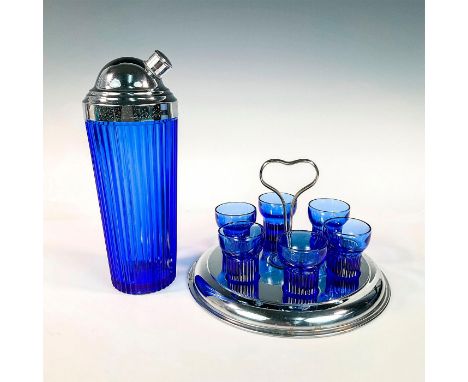 Ridged shaker with 6 ridged drink glasses on chrome drink caddy. Shaker: 3.5"L x 3.5"W x 10"H. Caddy: 9"L x 9"W x 6"H.Glasses