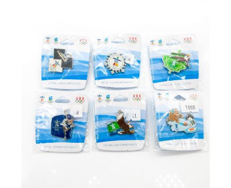Vintage. Each with unique sports or Canadian themed design. Aminco backstamp. Sealed.This item has no reserve. Dimensions: 1"