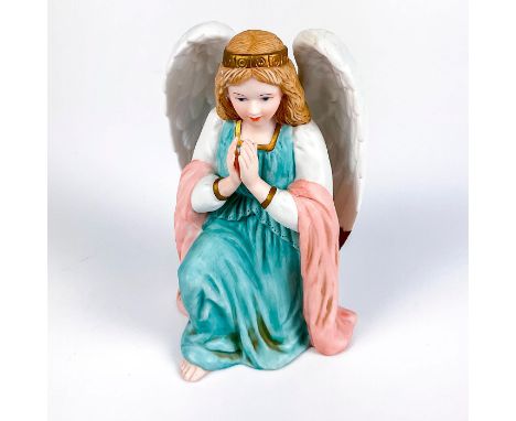 Matte porcelain angel with open wings kneeling down saying a prayerHome Interiors &amp; Gifts stamp on bottom. This item has 