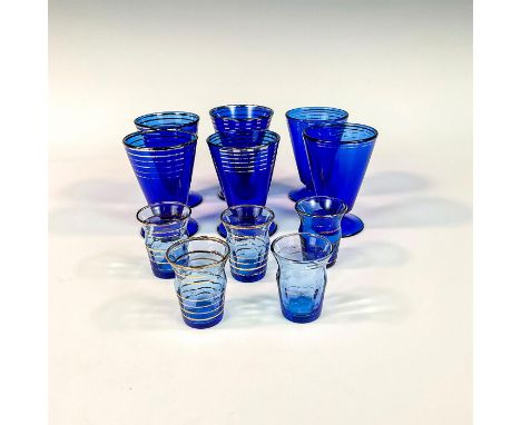 Shaker and 6 glasses are silver rimmed. Set of 5 gold rimmed liqueur glasses. Largest item measures: 4"L x 4"W x 8.5"H. Count
