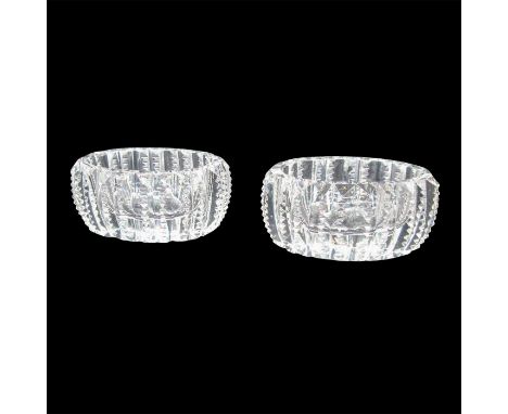 Translucent salt cellars decorated with vertical and diamond-shape cut designs.This item has no reserve. Dimensions: 2.25"L x