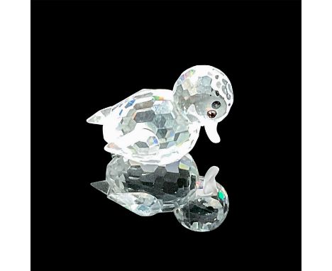 Clear faceted crystal body, frosted bill, and jet crystal eyes. Swarovski acid mark on the rear. This item has its original b