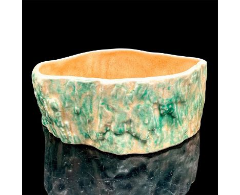 Roseville style planter modelled as a tree trunk in green and tan coloration. Dimensions: 8.5"L x 6.25"W x 3.5"HCondition: Ag
