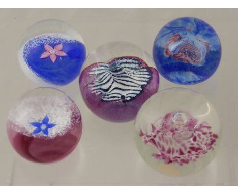 Five Caithness Glass Paperweights, including Fleur (Pink), Millennium Miniature, Fleur (Blue), Silkie and Sentinel. 