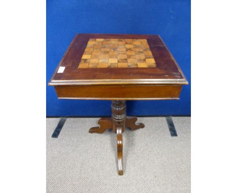 A vintage chess / draughts games table, mahogany with inlaid playing board to the top, turned tripod base with three splayed 