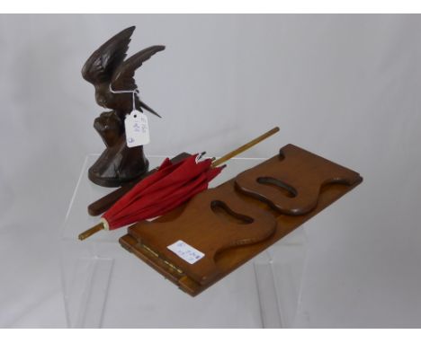 A Black Forest Style Wood Carved figure of an Eagle, a black lacquer box with leaf and butterfly design to lid, a wooden book