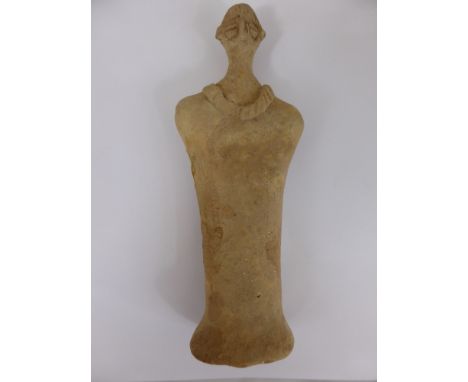A Syro-Hittite Terracotta Figure, shows a face embellished with bird-like features with round concentric eyes. Cords beneath 