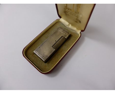 A Vintage Dunhill Lighter, patent no. 726982 in the original box. 