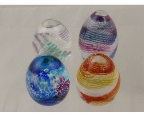 Four Caithness Domed Paperweights, including Feather 2006, Sands of Time, Purple Swirl, Fortune 2004.