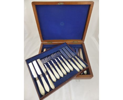A Mother of Pearl handled Fish Knife and Fork Set, 12 pieces, in the original presentation box, fine condition.