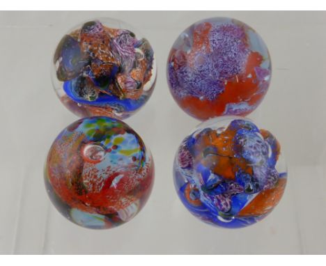 Four Caithness Paperweights, including Brimstone (blue/orange nr H26322), Rainbow Gem (red), Brimstone (purple/orange nr 1445