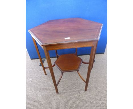 An Antique Edwardian Mahogany Octagonal Table having inlaid banding to the top, the under shelf and legs, est. 69 x 69 x 72 c