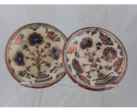 A Pair of Antique Hispano-Moresque Style Copper Lustre Ceramic Bowls, the bowls decorated with blue flowers within a border o