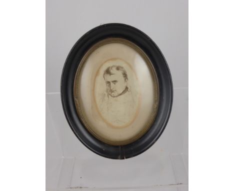 A Fine 19th Century Sepia Miniature Portrait Study of Napoleon. The portrait in a ebonized oval and glass frame. 