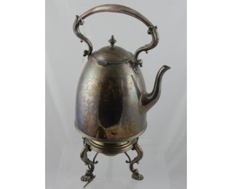 A large silver plated spirit kettle, the tripod stand with shell feet by Elkington & Co. together with a silver plated shell 