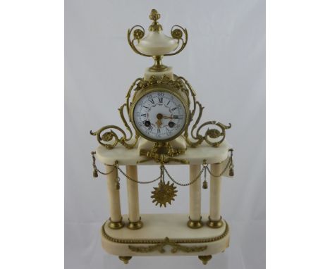 A 19th century French Japy Frere Cream Marble Mantel Clock and Garniture set, the clock having a porcelain dial and combined 