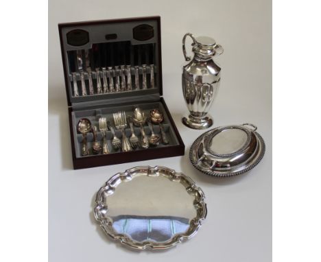 A Viners canteen of EPNS flatware and cutlery, an EPNS vegetable tureen and cover, a silver plated pie-crust waiter and a lar