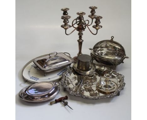 A box of silver plate to include an asparagus warmer, trays, a candelabra, food warmers and other item items
