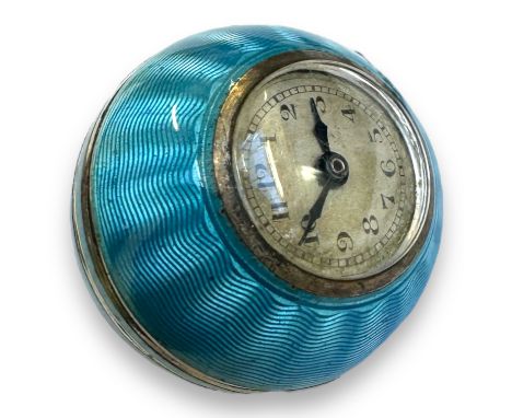 An early 20th century silver gilt and blue guilloche enamel spherical pendent watch, Swiss movement and Champagne Arabic dial