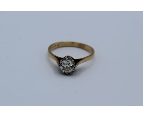 An Old Mine Cut diamond solitaire ring. Featuring an old cut diamond of approximately 6.0mm in diameter and an approximate de