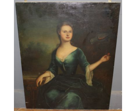 Manner of John Verelst Portrait of a young lady. seated three quarter length, wearing a green dress, holding cherries, with a