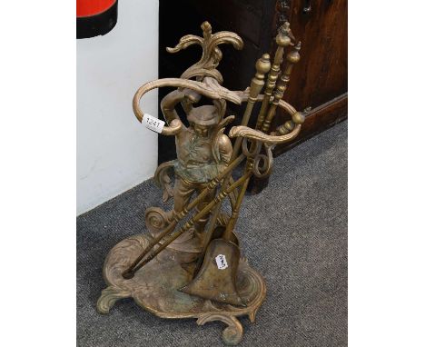 A Brass Figural Stick Stand, 60cm, together with four various fire tools