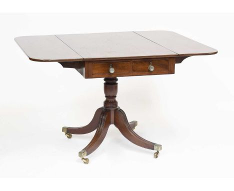 A 19th Century Mahogany Sofa Table, fitted with two short drawers, opposed by a dummy drawer on a turned support issuing four