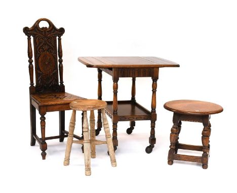 An Oak Drinks Trolley, An Oak Lamp Table, A Carved Oak Hall Chair, A Pine Stool, An Oak Wall-Mounted Coat Rack and A Pine Thr