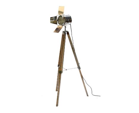 A Reproduction White Metal Film Studio Style Lamp, on adjustable wooden tripod baseIn working order.In good condition.