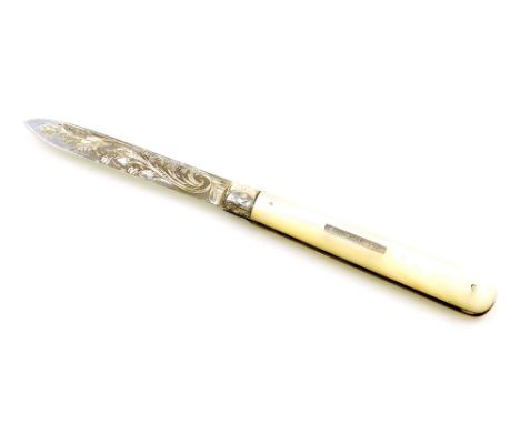 A George V silver mother of pearl fruit knife, inscribed M. Sabin, Sheffield 1914, 15.5cm long. 