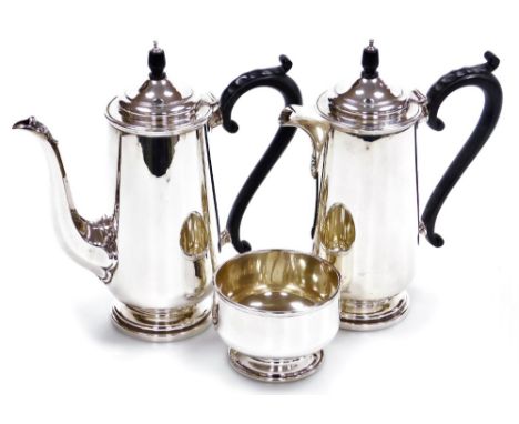 A George V silver coffee pot, matching hot water jug and sugar basin, Robert Pringle and Sons, London 1918, 41½oz gross. 