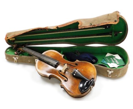 A violin, bearing Joseph Guarnerius Anno 1720 label, two piece back, 58cm wide, in a JE TRL Sarasate case, with two rosewood 