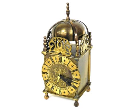 A Smiths brass lantern clock, the dial stamped Smiths Great Britain, with quartz movement, 15cm high. 