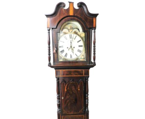 An early 19thC flame mahogany and boxwood inlaid longcase clock, the moon phase arched dial painted with cottages, windmill a