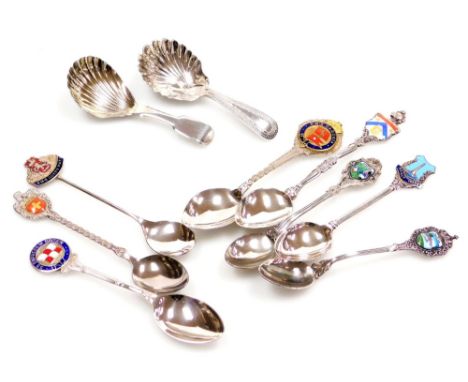 A Victorian silver fiddle pattern caddy spoon, with a fluted bowl, George Unite, Birmingham 1874, and another with a shell bo