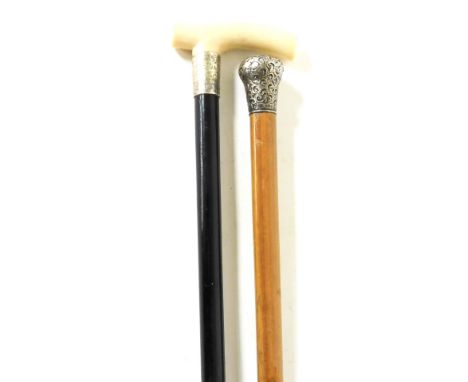 An early 20thC ebony walking stick with ivory handle, the silver collar engraved 'Presented To ex PC James Curley By Members 