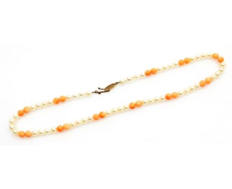 A coral and cultured pearl necklace, on a knotted strand with a 9ct gold clasp, 38cm long, 15.6g all in, boxed.