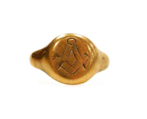 A Masonic 9ct gold signet ring, engraved with the square and compass, ring size R, 4.2g. (AF) 