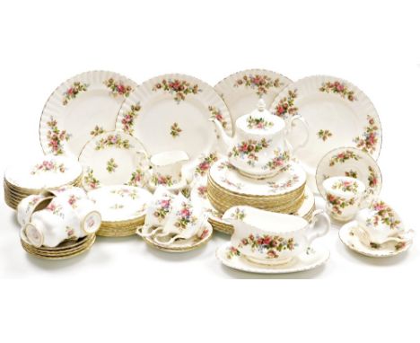 A Royal Albert Moss Rose pattern part tea and dinner service, comprising sauce boat on stand, eight dinner and dessert plates