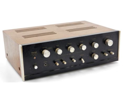 A Sansui solid state stereo amplifier, model number AU-666, in a teak case, 42cm wide. 