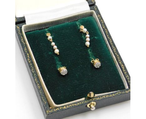 Two pairs of earrings, comprising a pair of small 9ct gold diamond cluster earrings each set with seven stones, and a pair of