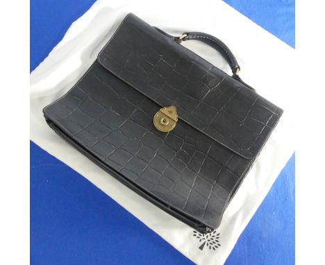 A Mulberry black 'Congo' Briefcase,&nbsp;with older-style metal clasp stamped with Mulberry logo, the interior with two compa
