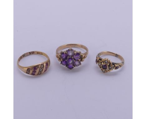 A small antique garnet and seed pearl cluster Ring, on unmarked 9ct gold shank, Size E, together with an amethyst cluster rin