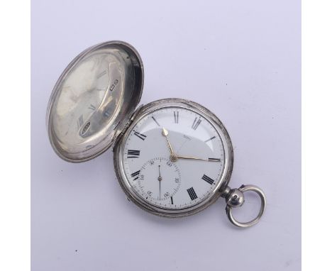 A Victorian silver hunter cased Pocket Watch, by James McCabe, London, the white enamel dial marked '12777' with the key wind