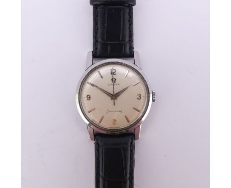 A vintage Omega Seamaster stainless steel Wristwatch,&nbsp;the oyster coloured dial with steel baton markers and Arabic quart
