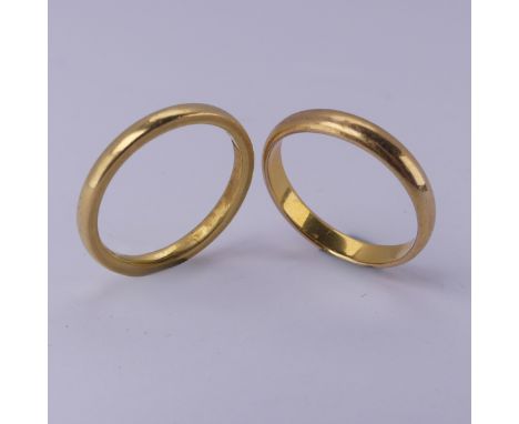 Two 22ct yellow gold Bands, Size L½ and K, total weight 6.4g (2)